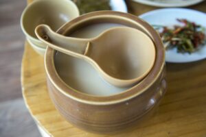 Makgeolli rice wine in traditional bowls